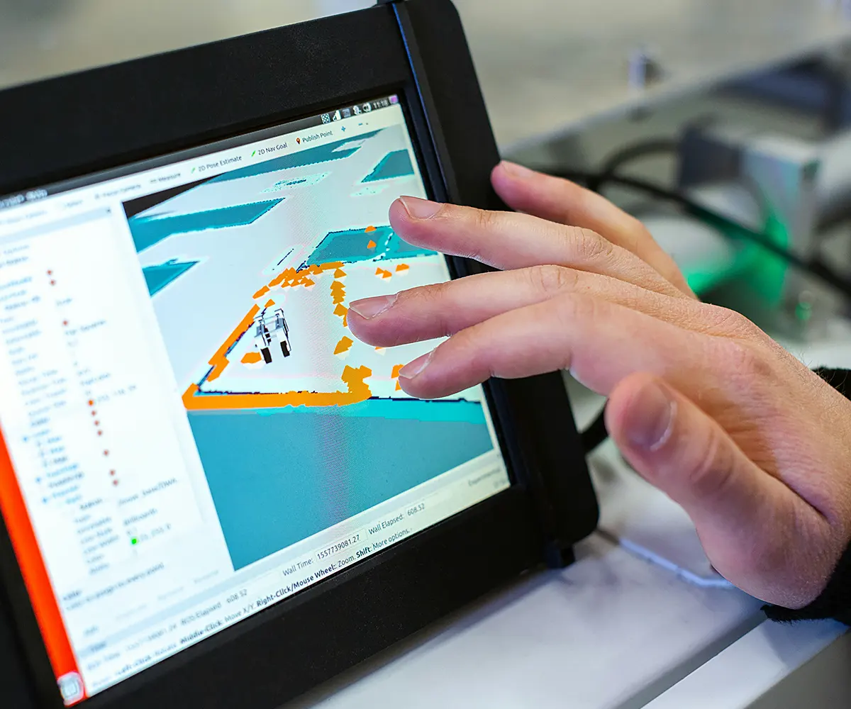 construction-software-digital-mapping-tablet Engineer using tablet-based construction software with digital site mapping interface