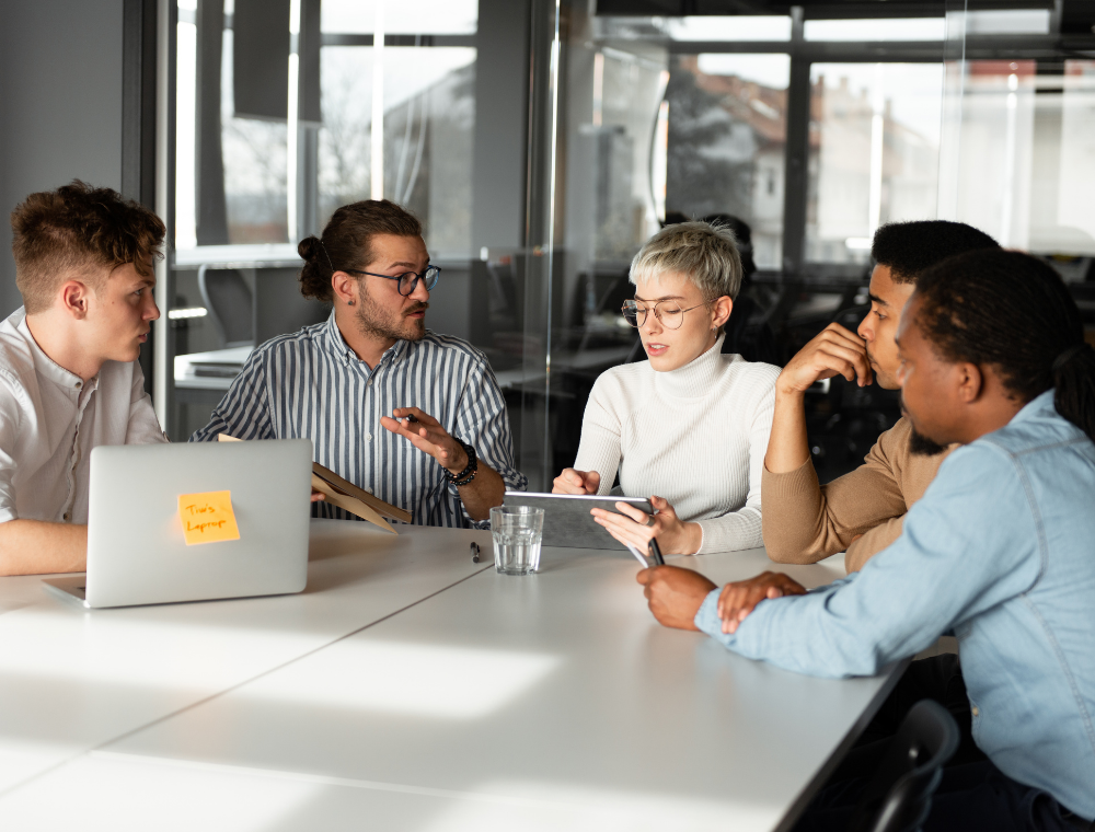 Microsoft Copilot consulting team meeting to plan implementation strategy and improve business workflows