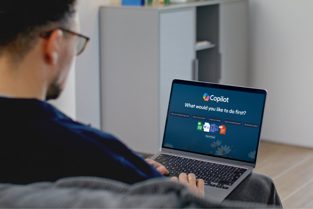 Microsoft Copilot for business shown on a laptop helping a professional use AI tools for productivity and workflow automation