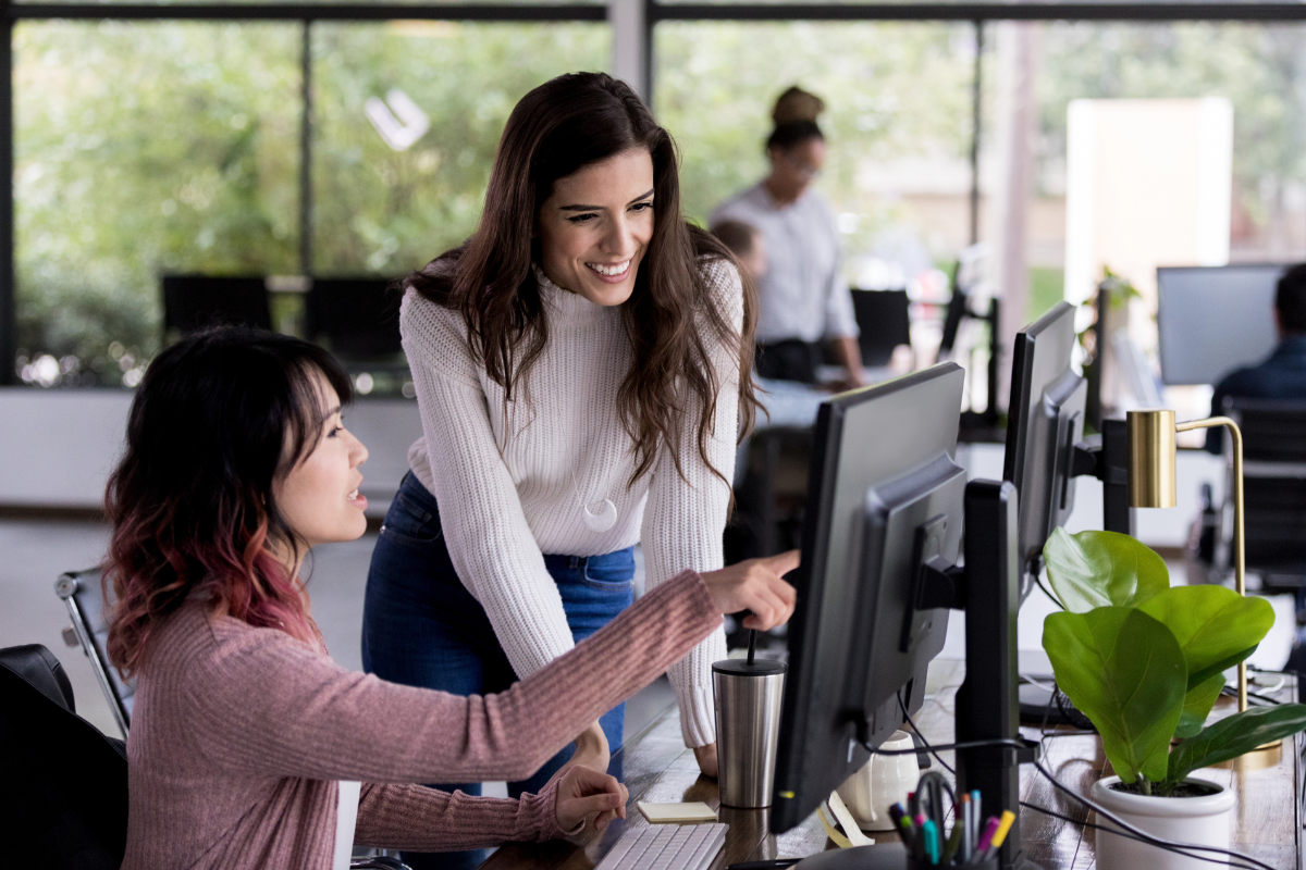 Microsoft Copilot training showing team guidance and support to help employees use AI tools effectively